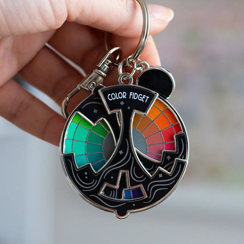 ChromoSpin Pin – Das Farbenrad, das niemals stillsteht