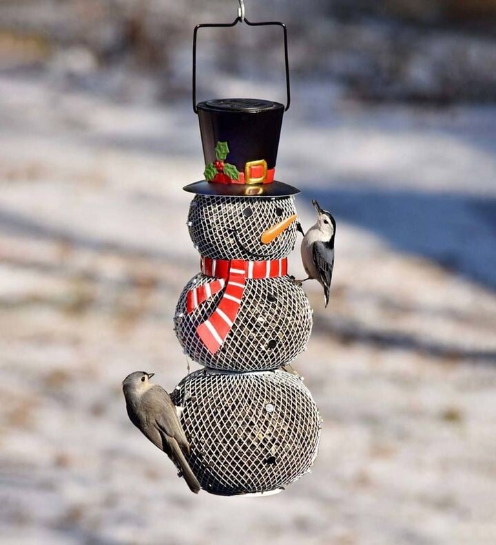 WinterZauber – Solar-Schneemann Vogelfutterspender mit Lichterglanz